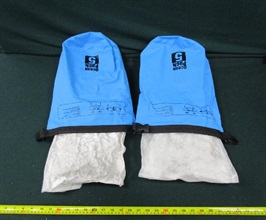 Hong Kong Customs seized about 1 kilogram of suspected cannabis buds with an estimated value of about $260,000 at Hong Kong International Airport on September 11. Photo shows the suspected cannabis buds seized and two waterproof bags used to conceal those suspected cannabis buds.