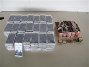 The unmanifested smartphones and computer central processing units seized by Customs.