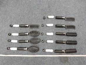 Hong Kong Customs seized about 1.8 kilograms of suspected cocaine at Hong Kong International Airport yesterday (May 22). Photo shows the suspected cocaine concealed inside combs.