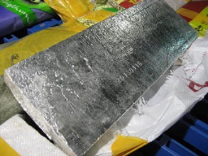 An unmanifested silver slab seized in the operation.