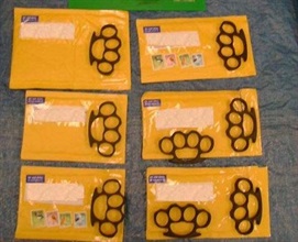 Eight knuckledusters, which were prohibited weapons, seized from six outbound small packets at the Air Mail Centre on February 1, 2008.