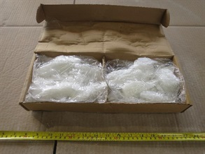 Hong Kong Customs made a record seizure of suspected methamphetamine (commonly known as "ice") following the discovery of over 500 kilograms of the drug with an estimated market value of nearly $300 million concealed in cement in a container at the Tsing Yi Customs Cargo Examination Compound on October 29. Picture shows suspected "ice" in a carton.