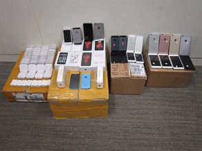 Hong Kong Customs joined with the United States (US) Immigration and Customs Enforcement and the US Customs and Border Protection to conduct an operation in mid November 2016 to fight transnational counterfeiting activities. As a result, about 1 300 pieces of suspected counterfeit electronic products with an estimated market value of about $1.3 million were seized in Hong Kong. Photo shows part of the seizure.
