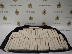 Hong Kong Customs yesterday (June 14) seized about 57.6 kilograms of suspected worked ivory with an estimated market value of about $1.15 million at Hong Kong International Airport.