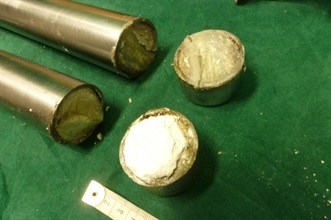 The cocaine was concealed inside the hollow part of two rods.