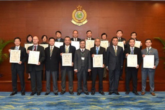 The Assistant Commissioner of Customs and Excise (Excise & Strategic Support), Mr David Fong (front row, centre), and representatives of the 15 Authorized Economic Operators at the presentation ceremony today (January 10).
