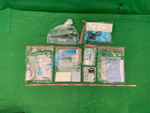 Hong Kong Customs seized about 12.5 kilograms of suspected cocaine with an estimated market value of about $12.3 million at Hong Kong International Airport on July 27. Photo shows a batch of drug packaging paraphernalia seized in the case.
