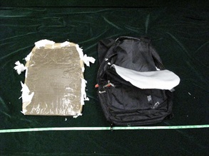 The suspected cocaine was found concealed in the back of rucksack.
