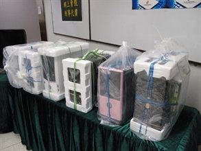 Desktop computers installed with pirated software seized from computer chain stores.
