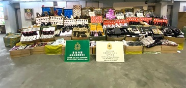 Hong Kong Customs seized about 55 000 items of suspected counterfeit and smuggled goods with an estimated market value of about $5.6 million at Man Kam To Control Point on October 26. This is the largest counterfeit goods smuggling case detected by Customs at land boundary control points in the past three years.