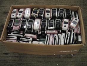 Used mobile phones seized by Hong Kong Customs.