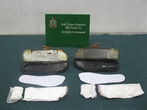 A total of 350 grammes of heroin, worth about $316,000, was concealed underneath the insoles of a pair of sandals.