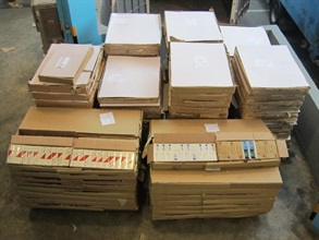 Some of the suspected smuggled cigarettes seized in the operation were concealed in boxes.