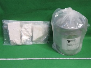Hong Kong Customs seized about 520 grams of suspected ketamine and about 1 kilogram of suspected cocaine at Hong Kong International Airport on November 22 and 23 respectively with a total estimated market value of about $1.6 million. Photo shows the suspected cocaine seized and the metal container used to conceal the dangerous drugs.