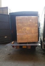 Suspected illicit cigarettes in carton boxes were found on the lorry.