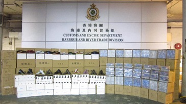 Hong Kong Customs yesterday (December 23) seized a total of about 7 800 suspected counterfeit hair straighteners and 3 700 suspected counterfeit sports shoes, with an estimated market value of about $4.6 million, from a 40-foot container at the Customs Cargo Examination Compound, River Trade Terminal, Tuen Mun.