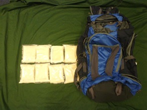 The suspected cocaine seized in the rucksack.