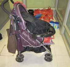 A baby stroller was used for carrying powdered formula.