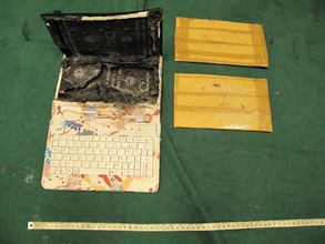 Suspected cocaine found inside the false compartment of a keyboard.