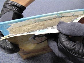 Close-up of the heroin concealed inside the book cover.
