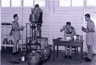 Officers assess the duty on a consignment of Chinese-type spirits in 1960s.