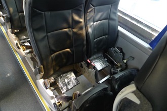 Central processing units (CPUs) concealed underneath the seat pads of passenger seats.