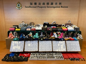 ​Hong Kong Customs seized about 2 800 items of suspected counterfeit goods with a total estimated market value of about $4.1 million at Man Kam To Control Point, Yuen Long and Kwai Chung from July 5 to 8. Photo shows some of the suspected counterfeit goods seized by Customs officers in Yuen Long and Kwai Chung.