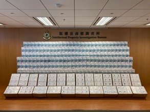 A person-in-charge of a logistics company was sentenced to 12 months' imprisonment today (September 30) by the West Kowloon Magistrates' Courts after an earlier conviction of possessing for trade counterfeit face masks, in contravention of the Trade Descriptions Ordinance. Photo shows the counterfeit medical-grade face masks involved in the case.