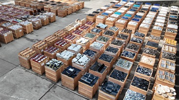 Hong Kong Customs on June 13 detected a suspected case of an ocean-going vessel being used to smuggle goods to the Mainland via Singapore at the Kwai Tsing Container Terminals. A large batch of suspected smuggled goods, including electronic goods, expensive food ingredients, table wines, music records and scheduled endangered species, with a total estimated market value of about $1.5 billion was seized. This is the largest smuggling case detected by Customs on record in terms of the seizure value. Photo shows some of the suspected smuggled goods seized.