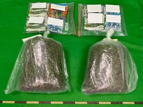 Hong Kong Customs on June 23 seized about 6.6 kilograms of suspected cannabis buds with an estimated market value of about $1.5 million in Kwai Chung. Photo shows the suspected cannabis buds seized and candies mix-loaded with the drugs.