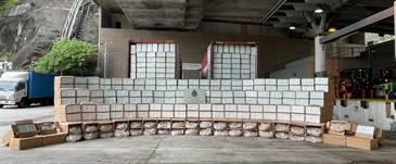 Hong Kong Customs detected a large-scale illicit cigarette smuggling case on August 15 and seized about 17 million suspected illicit cigarettes at the Kwai Chung Customhouse Cargo Examination Compound. The estimated market value was about $62 million with a duty potential of about $42 million. Photo shows the suspected illicit cigarettes seized.