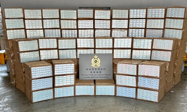 Hong Kong Customs detected two large-scale illicit cigarette smuggling cases at the Kwai Chung Customhouse Cargo Examination Compound in the past week, and seized about 15 million suspected illicit cigarettes in total. The estimated market value was about $54 million with a duty potential of about $36 million. Photo shows the suspected illicit cigarettes seized on September 21.