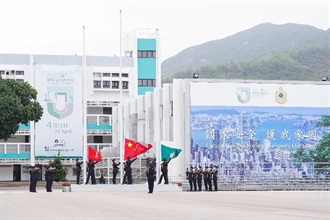 Hong Kong Customs is giving its full support to National Security Education Day and held the Hong Kong Customs College Open Day today (April 15). Photo shows members of the Customs and Excise Department Guards of Honour performing a Chinese-style flag raising ceremony to commence the Open Day.