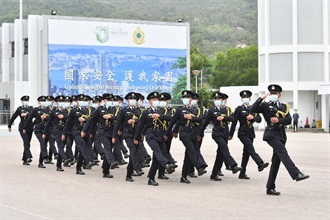 Hong Kong Customs is giving its full support to National Security Education Day and held the Hong Kong Customs College Open Day today (April 15). Photo shows members of the Customs and Excise Department Guards of Honour performing a Chinese-style foot drill to commence the Open Day.
