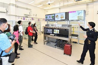 Hong Kong Customs is giving its full support to National Security Education Day and held the Hong Kong Customs College Open Day today (April 15). Photo shows visitors touring the Professional Development Training Block.