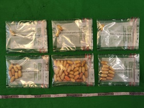 Hong Kong Customs on October 27 detected a dangerous drugs internal concealment case involving an incoming passenger at Hong Kong International Airport and seized about 720 grams of suspected cocaine with an estimated market value of about $770,000. Photo shows the suspected cocaine seized.