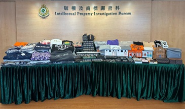 Hong Kong Customs conducted an enforcement operation yesterday (November 13) and detected a case of selling suspected counterfeit goods through live webcasts on a social media platform. About 2 400 items of suspected counterfeit goods, including perfume, clothes and accessories, with an estimated market value of about $620,000 were involved in the case. Photo shows some of the suspected counterfeit goods seized.