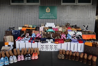 Hong Kong Customs conducted a 12-day joint operation with Mainland and Macao Customs from December 4 to 15 to combat cross-boundary counterfeiting activities among the three places and with goods destined for overseas countries. Photo shows some of the suspected counterfeit goods seized by Hong Kong Customs.