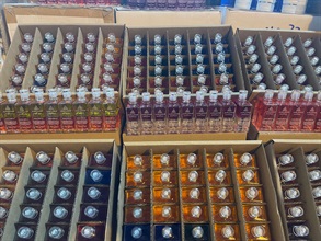 Hong Kong Customs on March 7 detected a suspected smuggling case involving a river trade vessel. A large batch of suspected smuggled goods　with a total estimated market value of about $24 million was seized. Photo shows some of the suspected smuggled fragrance oil seized.