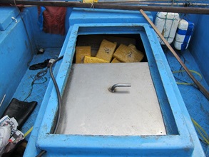 A hidden compartment on the motorised sampan, with some of the unmanifested goods found .