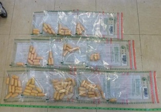 Eighty-nine pellets of cocaine seized by the Customs.