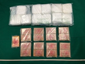 Hong Kong Customs yesterday (January 13) seized about 6.5 kilograms of suspected heroin and about 11kg of suspected methamphetamine with a total estimated market value of about $16 million in Cheung Sha Wan. Photo shows the suspected heroin and suspected methamphetamine seized.