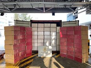 Hong Kong Customs on January 3 and today (January 6) seized a total of about 19 million suspected illicit cigarettes with an estimated market value of about $52 million and a duty potential of about $36 million at the Kwai Chung Customhouse Cargo Examination Compound. Photo shows the suspected illicit cigarettes seized by Customs officers from a seaborne container.