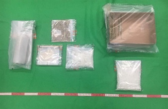 Hong Kong Customs seized about 31 kilograms of suspected liquid cocaine, about 910 grams of suspected ketamine and about 520 grams of suspected methamphetamine with a total estimated market value of about $45.7 million at Hong Kong International Airport and Yau Ma Tei on September 7 and yesterday (September 10). This has broken the record of this year's largest inbound dangerous drugs case detected by Customs at the airport on June 19 this year in terms of seizure amount and value. Photo shows the suspected ketamine, suspected methamphetamine and one set of suspected drug inhalation apparatus seized.