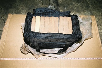 A nylon bag containing cocaine slabs.