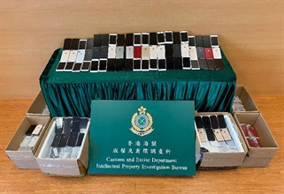 Hong Kong Customs seized a total of 829 suspected counterfeit mobile phones with an estimated market value of about $2.3 million in Kwai Chung and To Kwa Wan on September 16. Photo shows the suspected counterfeit mobile phones seized.