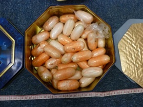 The suspected cocaine concealed in the candy box.