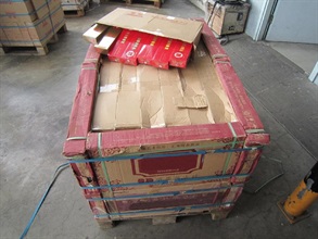 The suspected illicit cigarettes found among ceramic tiles.