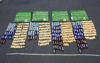 The suspected cocaine concealed in the candy packets.
