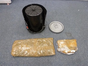The suspected cocaine concealed in insulating layer of the ice bucket.